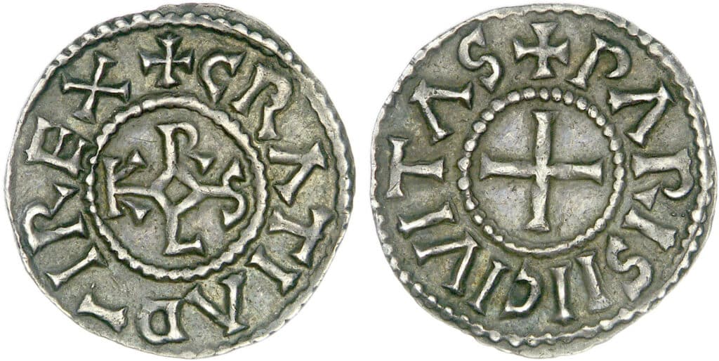 Silver denarius struck in Paris from 864, bearing the monogram of Charles II. Source : Wikimedia commons